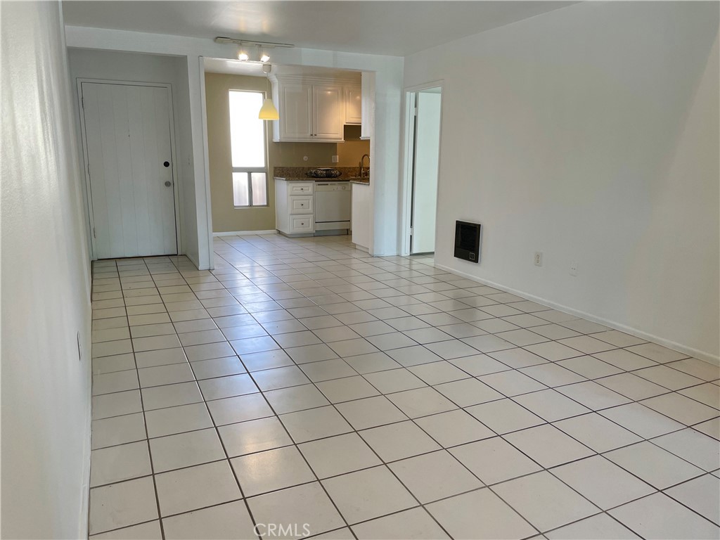 1000 West MacArthur Boulevard, Unit 87 Santa Ana, CA 92707 - Photo 2 of 36 a view of a kitchen with a sink