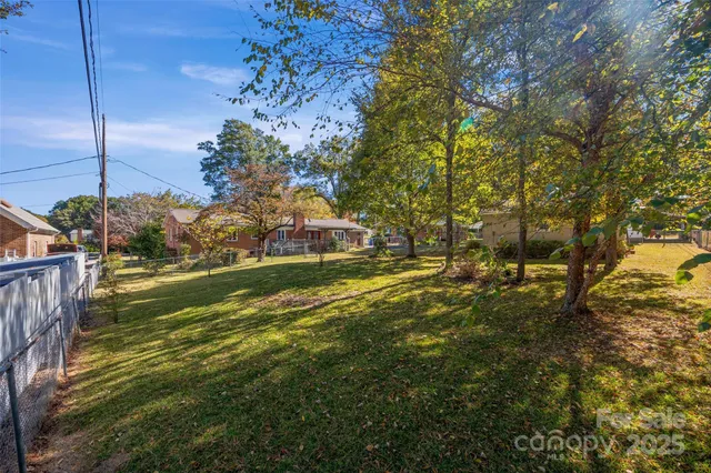 a view of a yard with an outdoor space