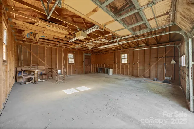 a view of a room with wooden walls