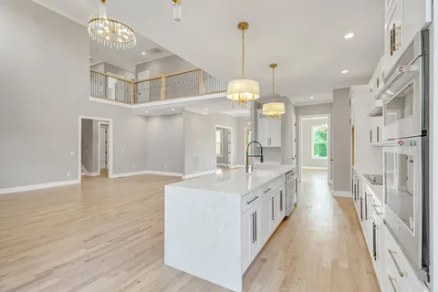 a spacious bathroom with a tub and shower