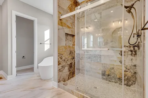 a bathroom with a double vanity sink and a mirror