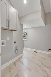 a view of a swimming pool with a yard