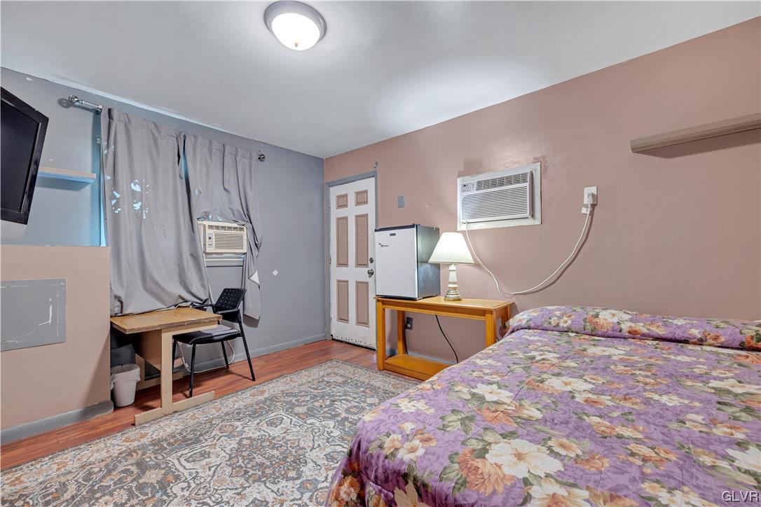 Undisclosed Address Saylorsburg, PA 18353 - Photo 17 of 18 a bedroom with a bed and a chair in it