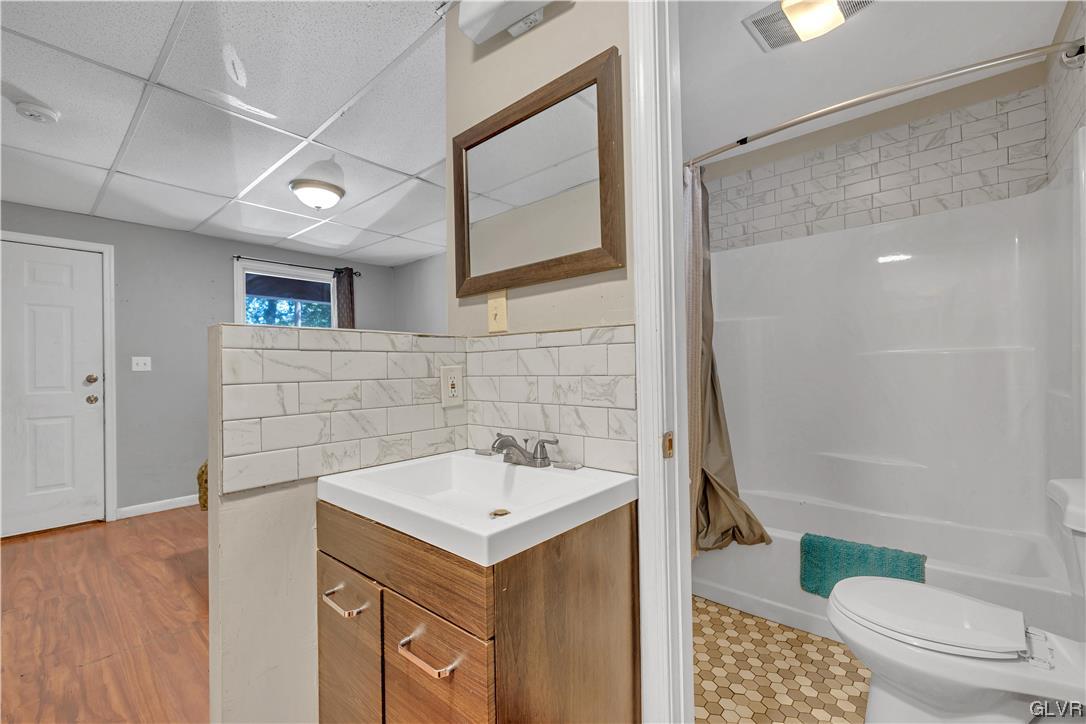 Undisclosed Address Saylorsburg, PA 18353 - Photo 7 of 18 a bathroom with a sink and a mirror