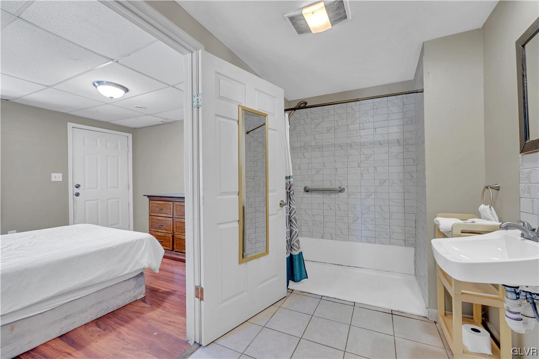 Undisclosed Address Saylorsburg, PA 18353 - Photo 10 of 18 a bathroom with a sink a toilet and shower