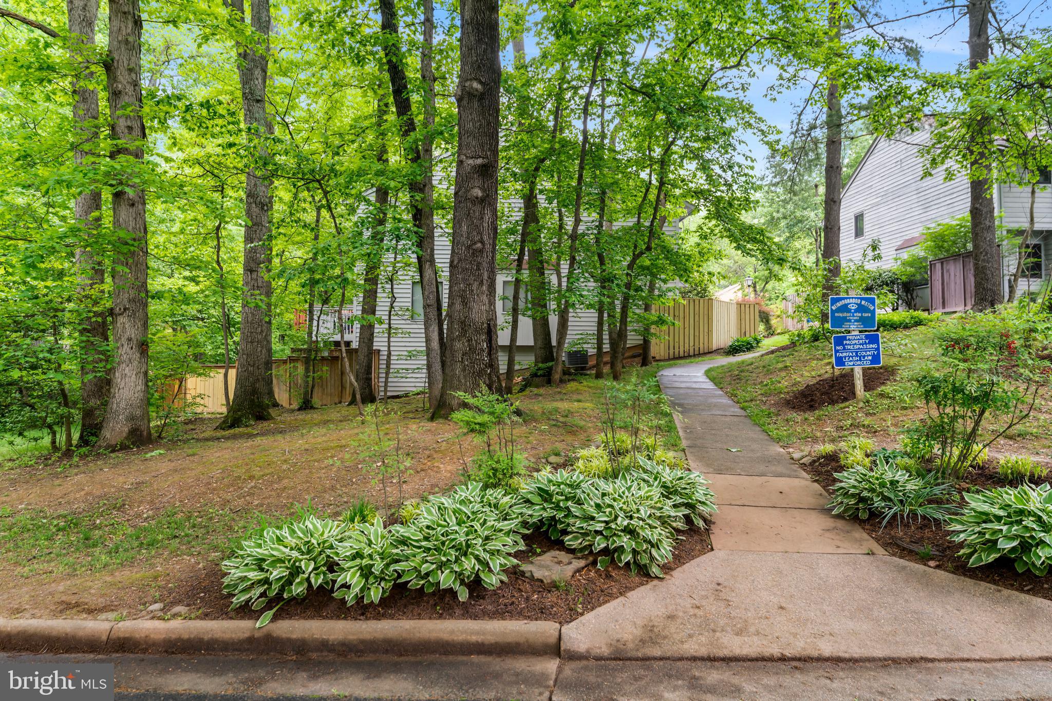 1980 Winterport Cluster Reston, VA 20191 - Photo 47 of 55 walkway to the lake