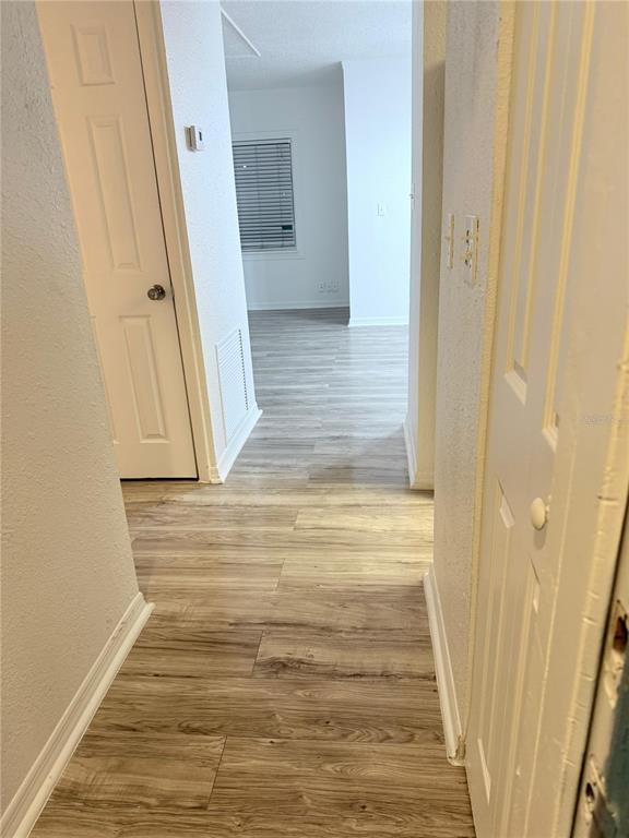 108 Booth Lane, Unit A Kissimmee, FL 34743 - Photo 10 of 19 a view of a walk in closet