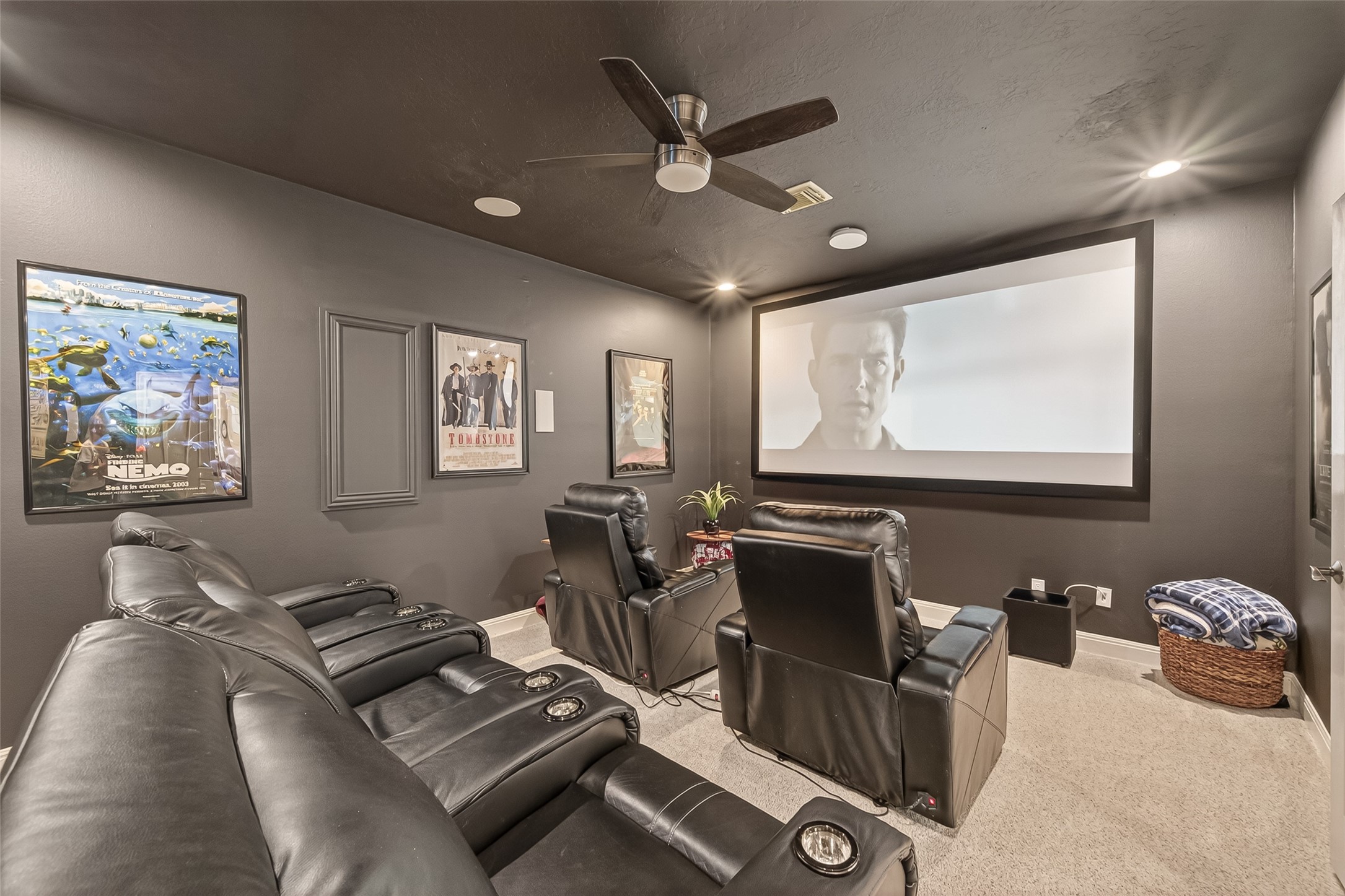 2319 Braer Ridge Drive Katy, TX 77494 - Photo 21 of 50 a living room with furniture a projector and a flat screen tv
