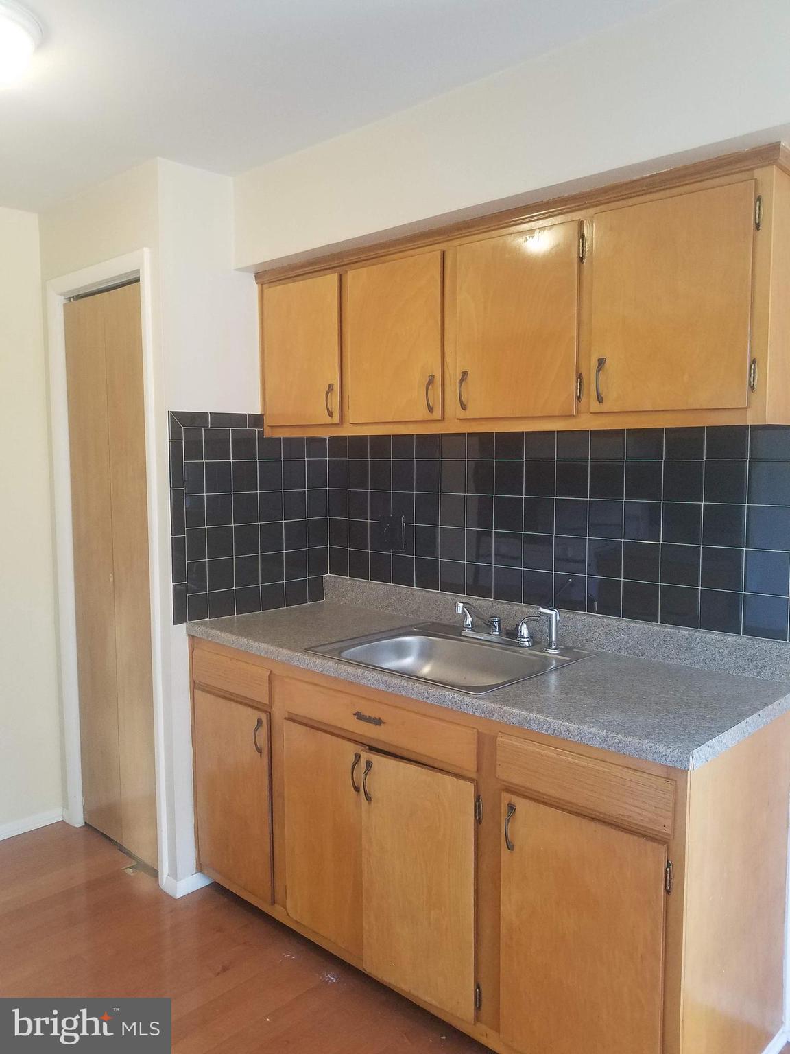 3115 Comly Road Philadelphia, PA 19154 - Photo 3 of 11 a kitchen with a sink and a shower