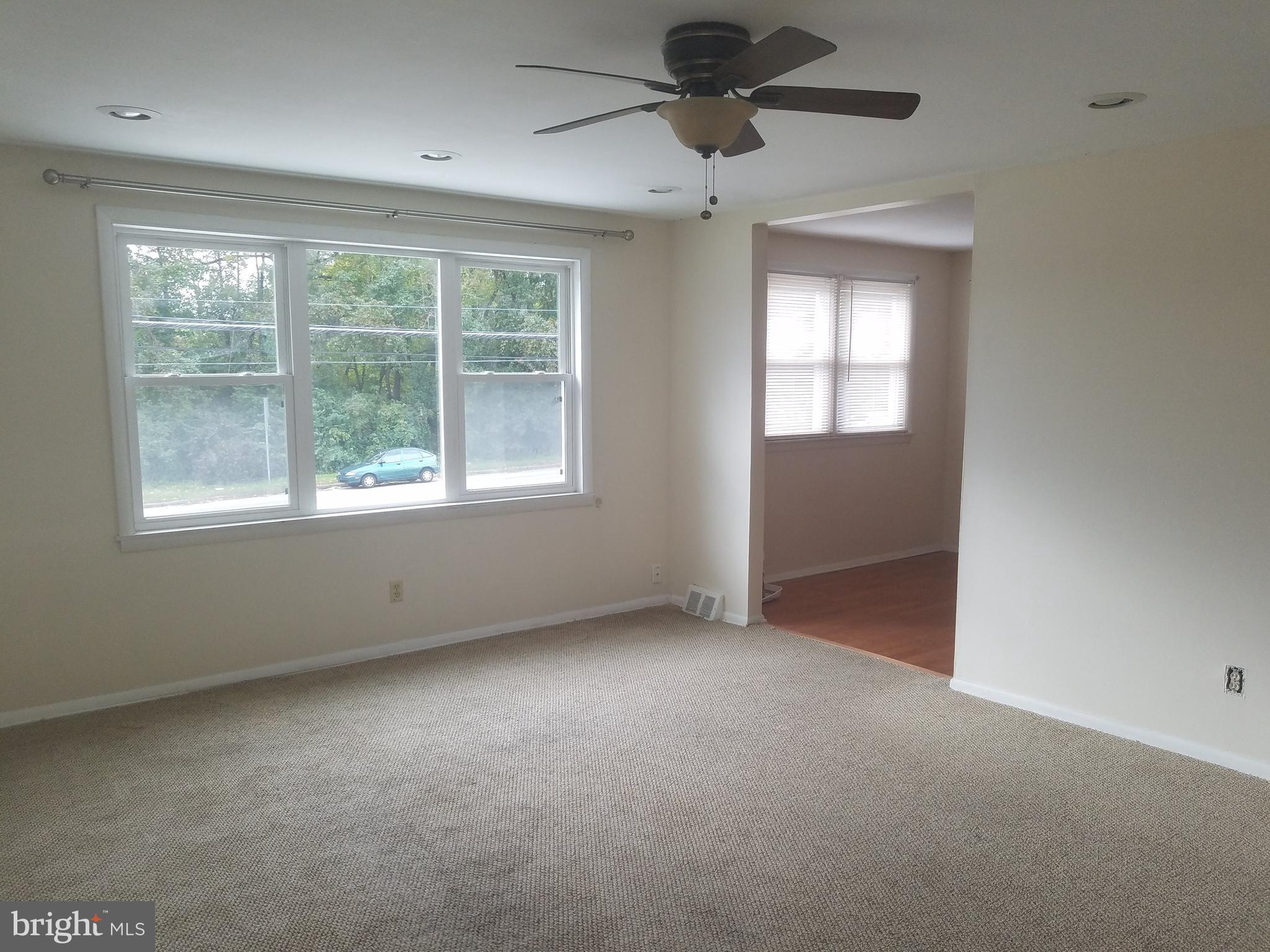 3115 Comly Road Philadelphia, PA 19154 - Photo 4 of 11 an empty room with a window and a ceiling fan