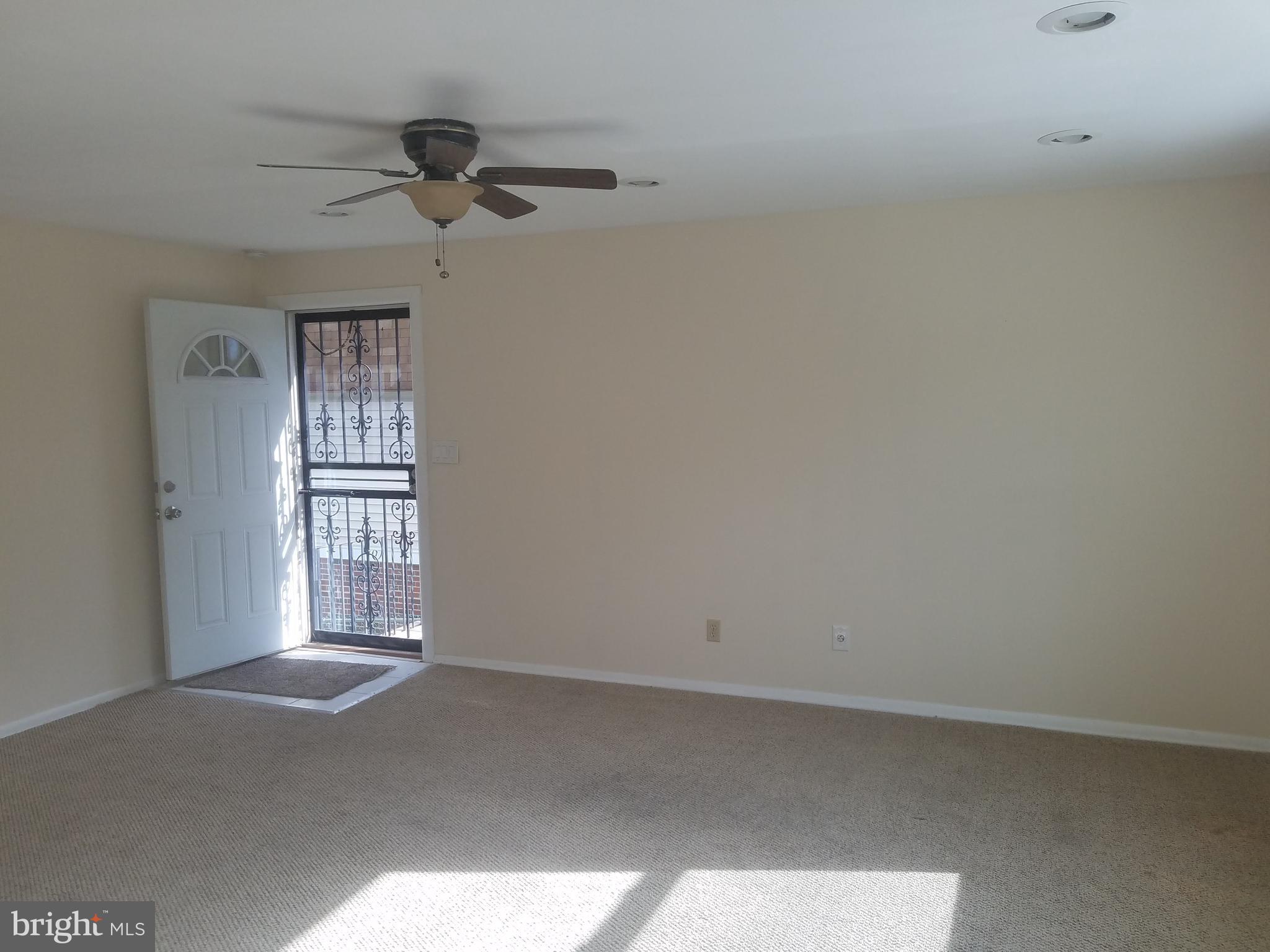 3115 Comly Road Philadelphia, PA 19154 - Photo 5 of 11 an empty room with windows and ceiling fan