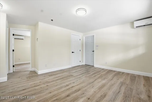 a bathroom with a sink a mirror and a bathtub