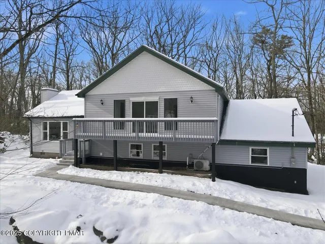 a house view with a backyard space