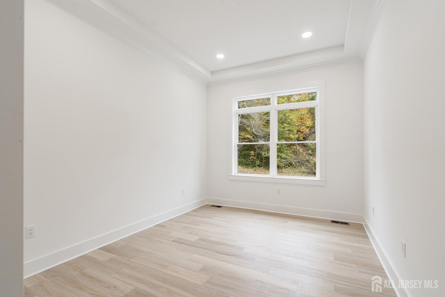 34 Mill Road Manalapan, NJ 07726 - Photo 15 of 30 an empty room with a window