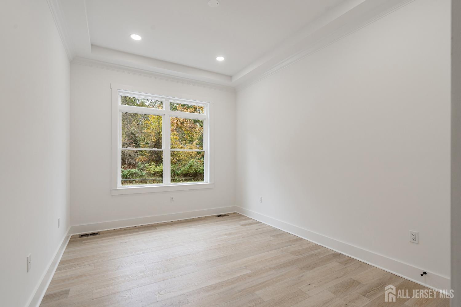 34 Mill Road Manalapan, NJ 07726 - Photo 16 of 30 an empty room with a window