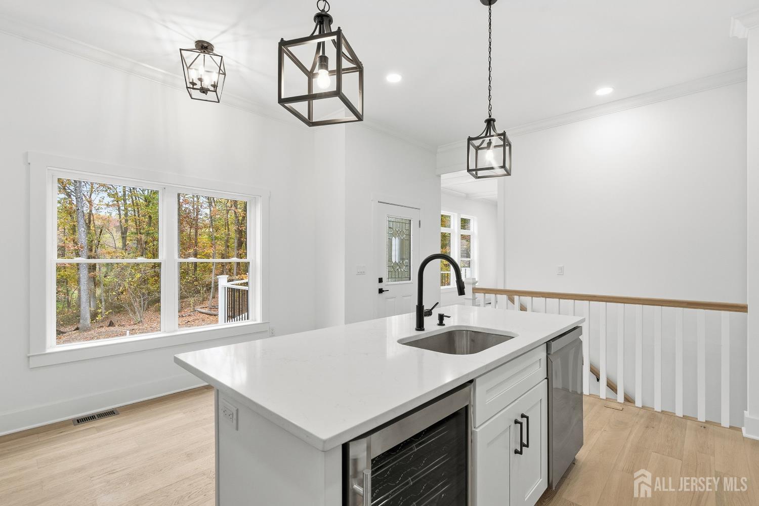 34 Mill Road Manalapan, NJ 07726 - Photo 8 of 30 a bathroom with a sink a vanity and a window