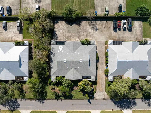 an aerial view of house with yard