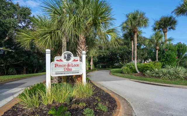 a sign on the side of the road