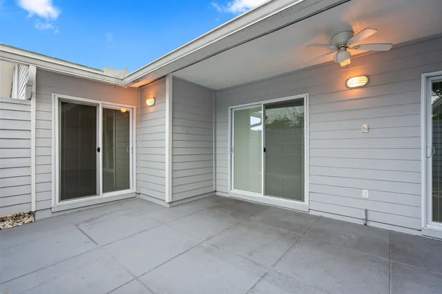 a view of an empty room with a bathroom
