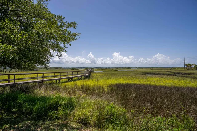 a view of a swimming pool and an outdoor space