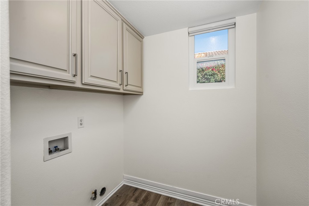 2981 Humeston Avenue Tustin, CA 92782 - Photo 29 of 52 Laundry room with storage
