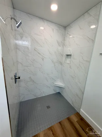 a view of a room with racks on the wall