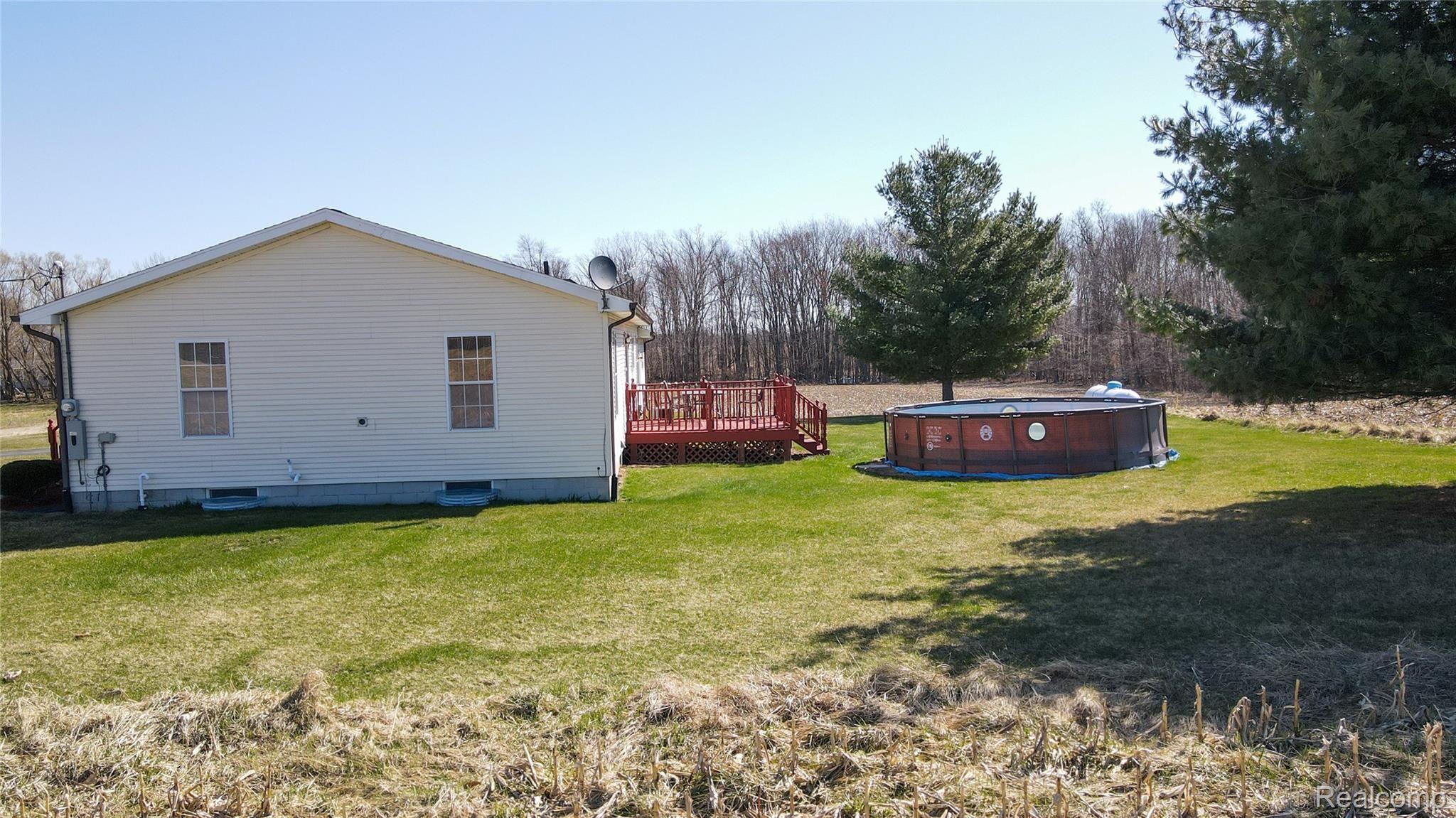 11595 West Sober Road Webberville, MI 48892 - Photo 36 of 42 11595 side.jpg