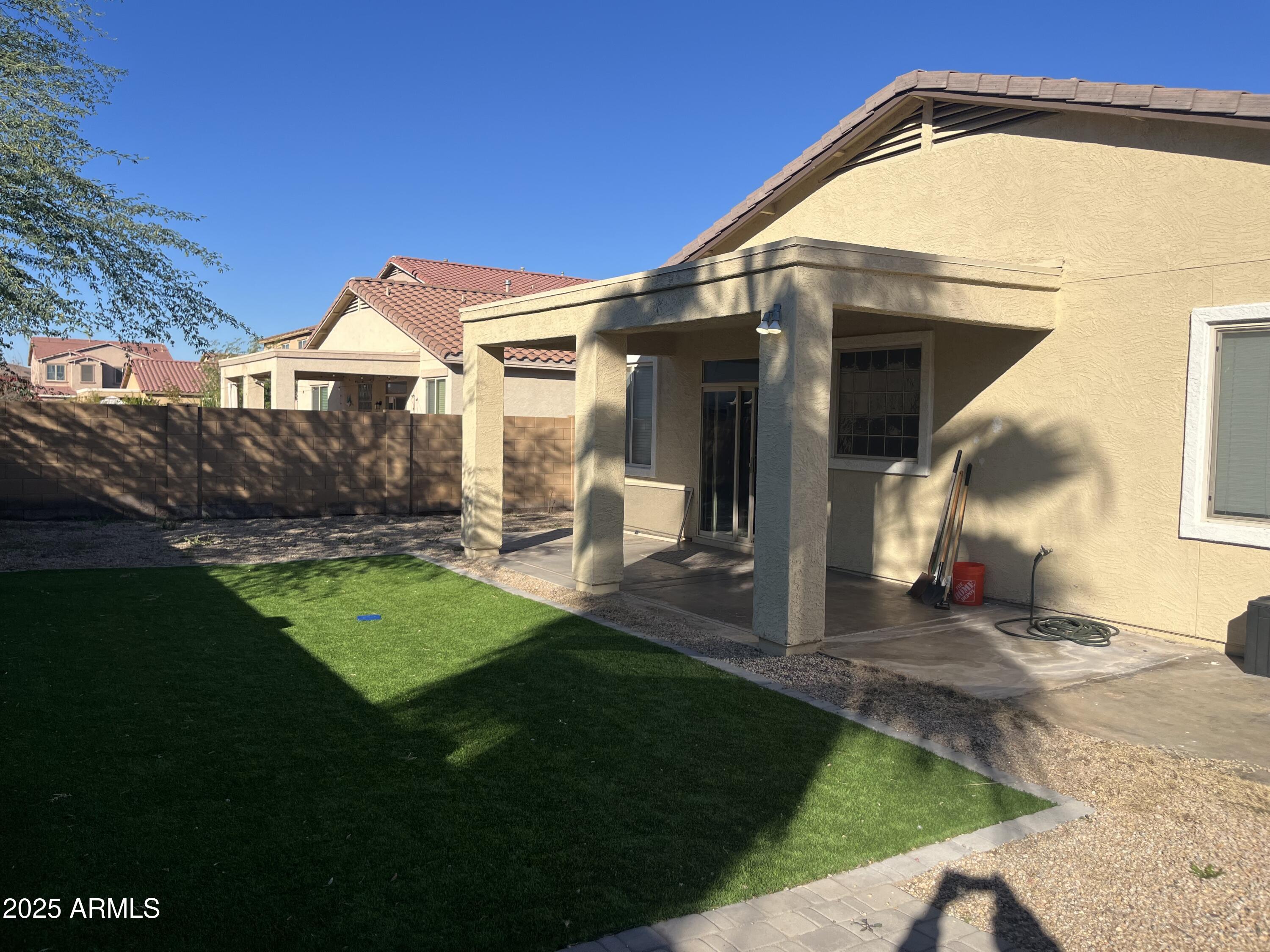 7007 West Carson Road Laveen, AZ 85339 - Photo 19 of 19 a view of a house with a yard