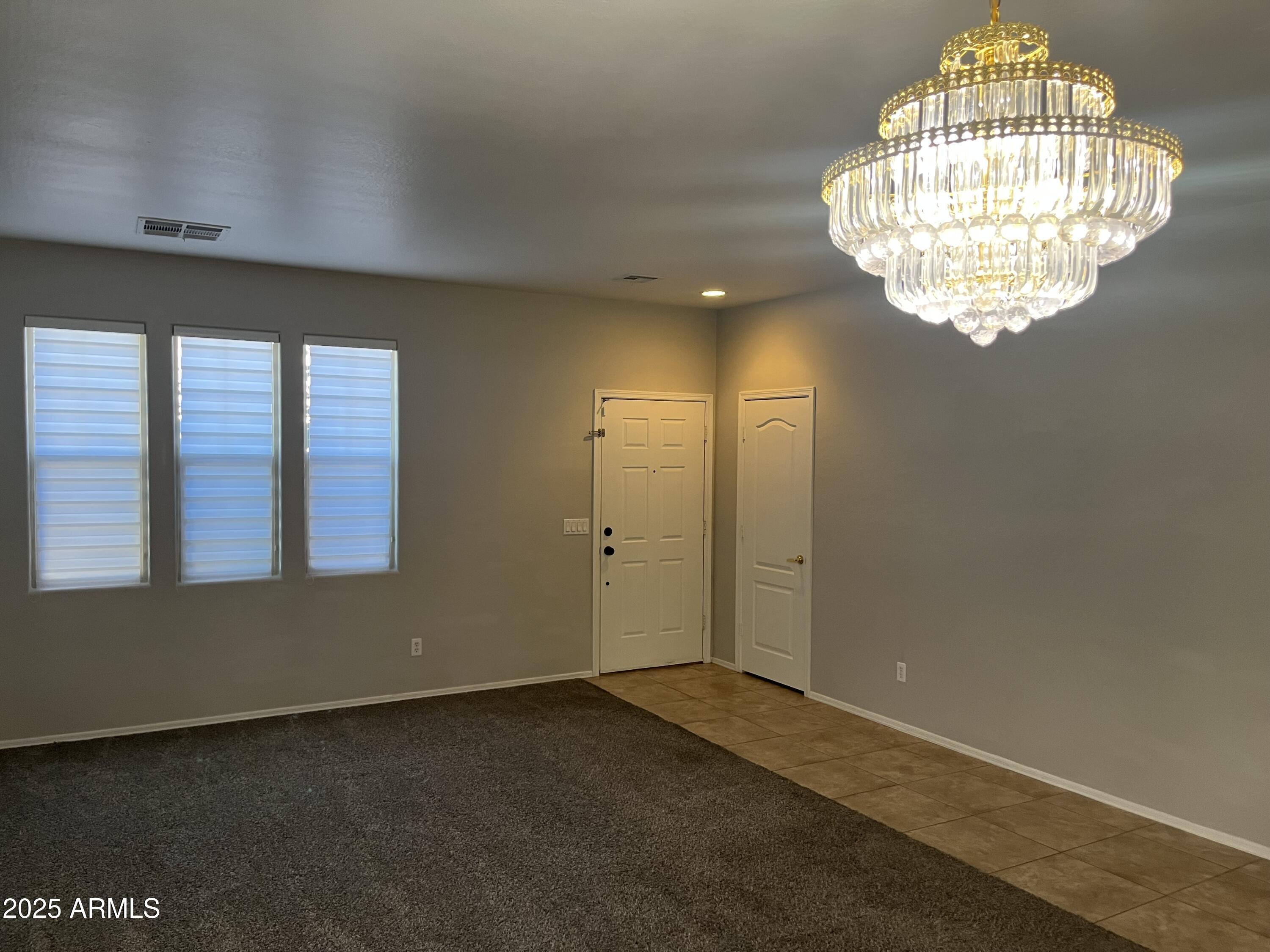 7007 West Carson Road Laveen, AZ 85339 - Photo 7 of 19 a view of an empty room and window