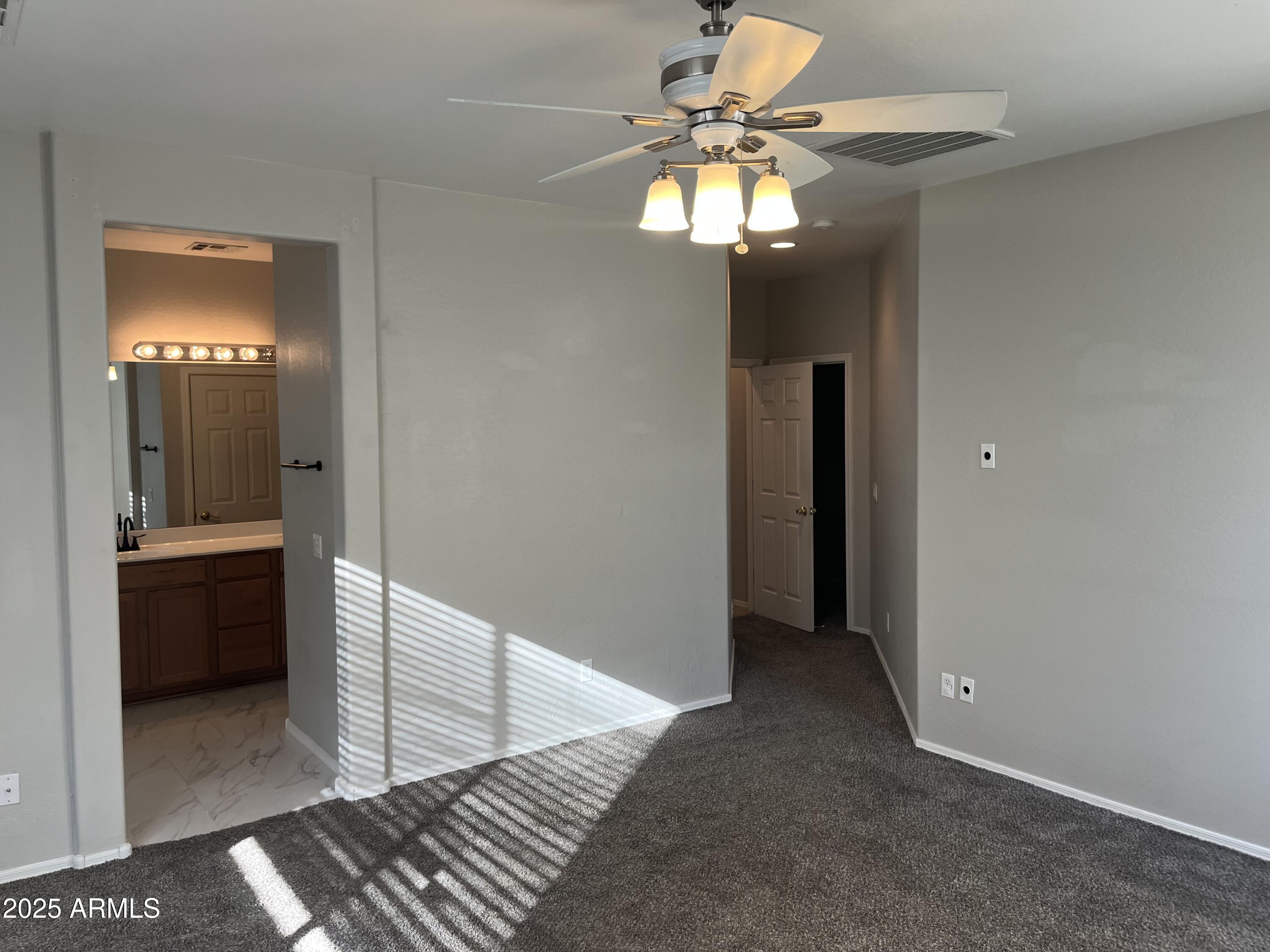 7007 West Carson Road Laveen, AZ 85339 - Photo 9 of 19 a view of a hallway view with wooden floor and staircase