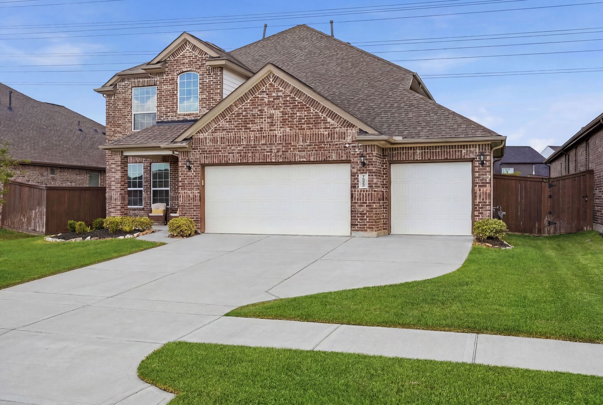 7522 Windsor View Drive Spring, TX 77379 - Photo 2 of 49 Wide driveway and clean front elevation create a polished and welcoming arrival.