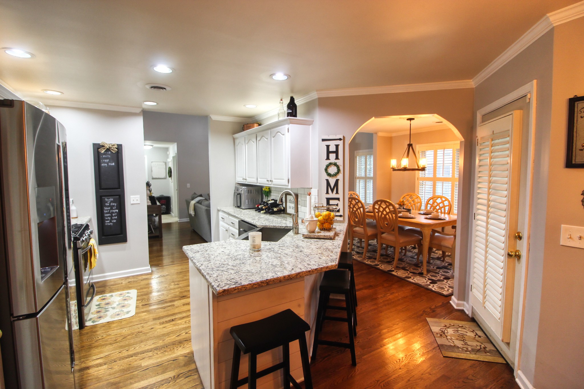 124 Fieldstone Lane Springfield, TN 37172 - Photo 5 of 21 a kitchen with stainless steel appliances granite countertop table chairs and a refrigerator