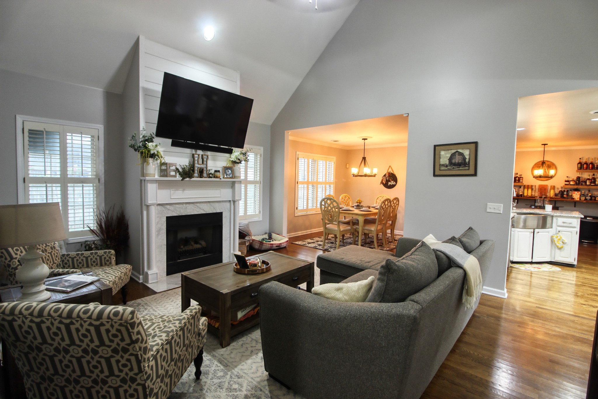 124 Fieldstone Lane Springfield, TN 37172 - Photo 9 of 21 a living room with furniture a fireplace and a flat screen tv
