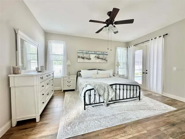 a bed room with a bed and flat screen tv