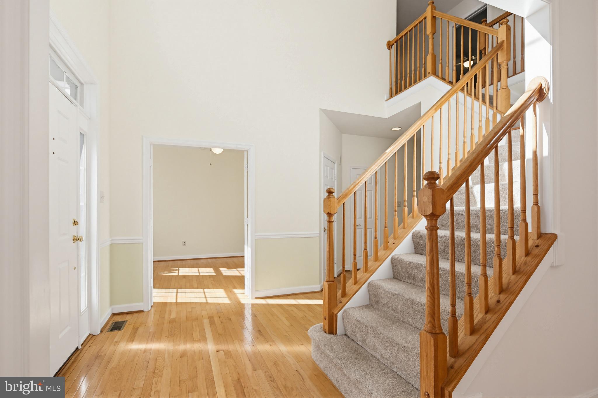 12017 Floating Clouds Path Clarksville, MD 21029 - Photo 22 of 54 a view of an entryway with wooden floor