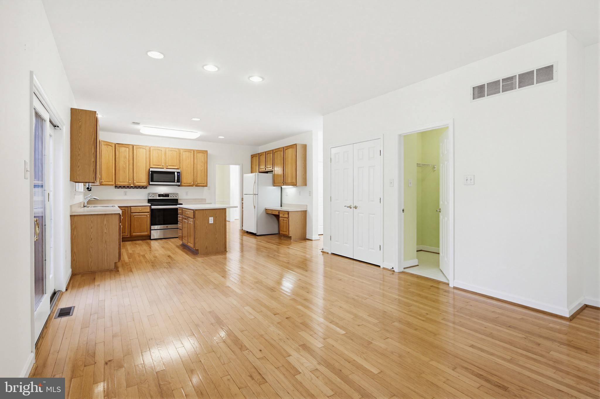 12017 Floating Clouds Path Clarksville, MD 21029 - Photo 29 of 54 a view of kitchen with stainless steel appliances granite countertop lots of counter top space and cabinets