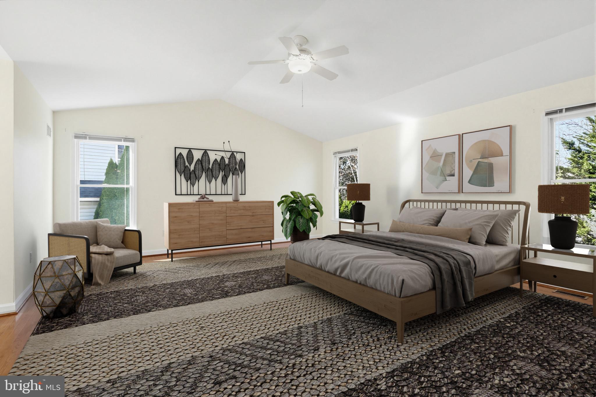 12017 Floating Clouds Path Clarksville, MD 21029 - Photo 8 of 54 a spacious bedroom with a bed couch and a window