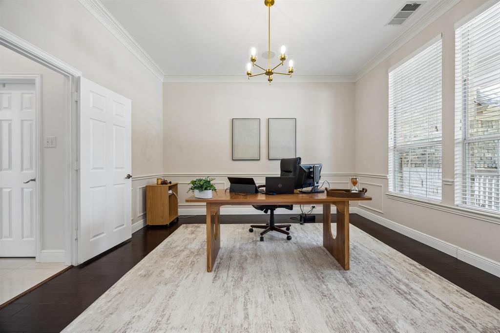 5808 Rathbone Drive Parker, TX 75002 - Photo 8 of 39 The dining room is currently used as an office and it is perfect for that! The room has an updated modern light fixture, hardwood flooring, chair rail with wainscoting and access to the kitchen via the butler's pantry.