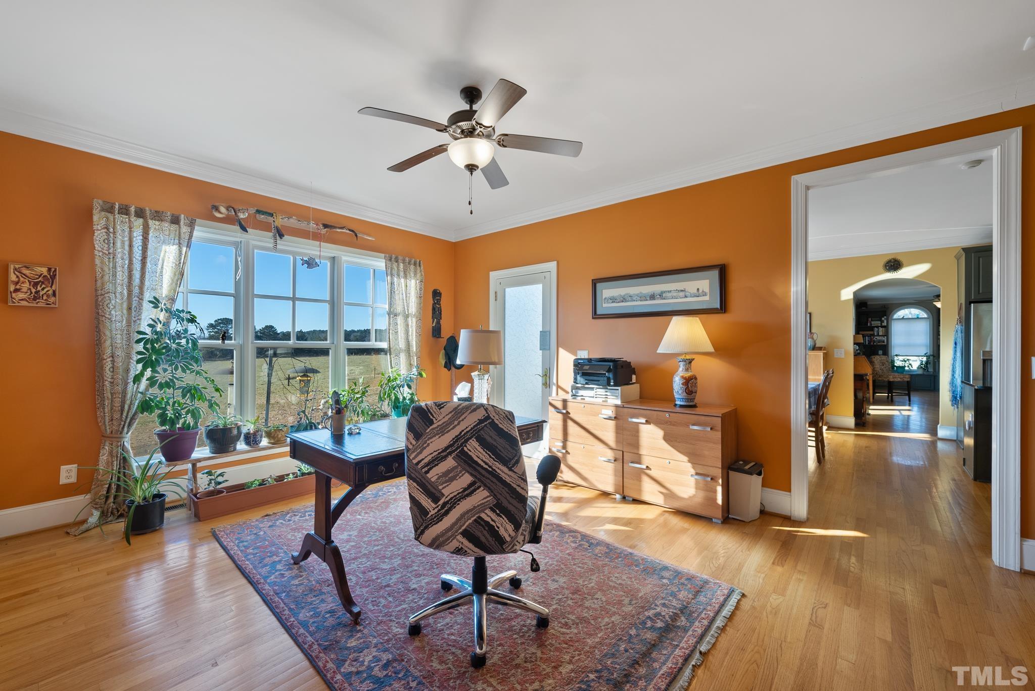 1616 Carl Durham Road Chapel Hill, NC 27516 - Photo 13 of 56 a living room with furniture and floor to ceiling window