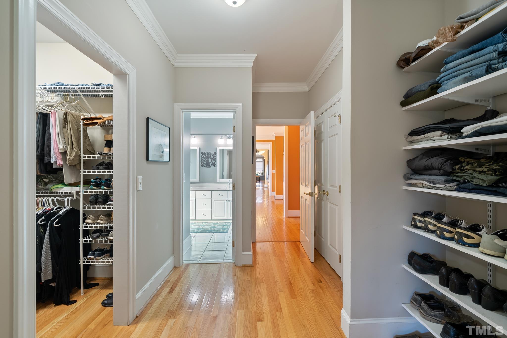 1616 Carl Durham Road Chapel Hill, NC 27516 - Photo 17 of 56 a view of hallway with closet and wooden floor