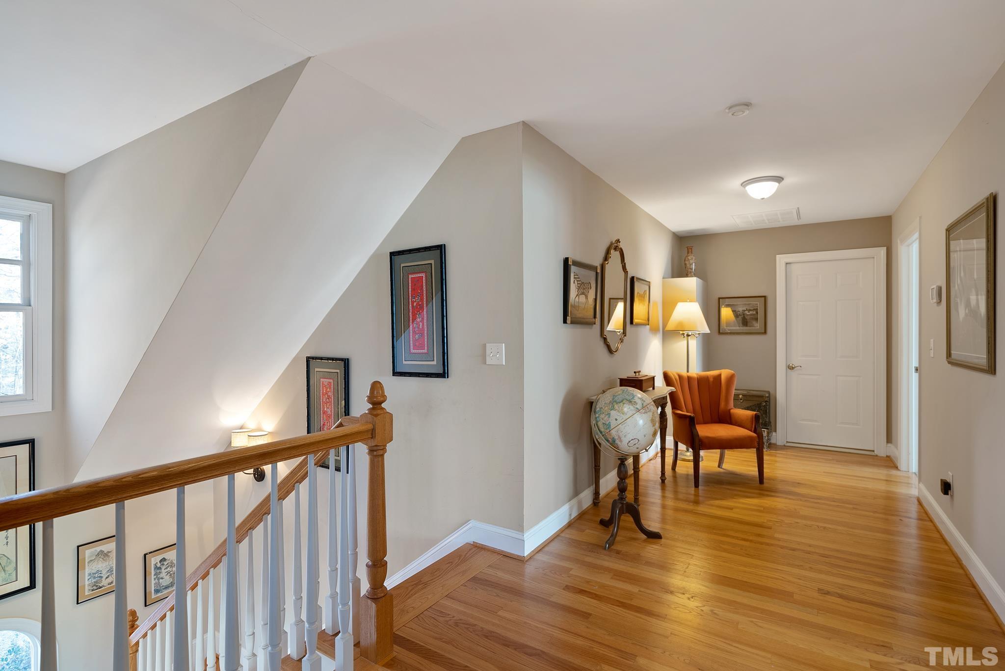 1616 Carl Durham Road Chapel Hill, NC 27516 - Photo 23 of 56 a view of a livingroom with furniture and hardwood floor