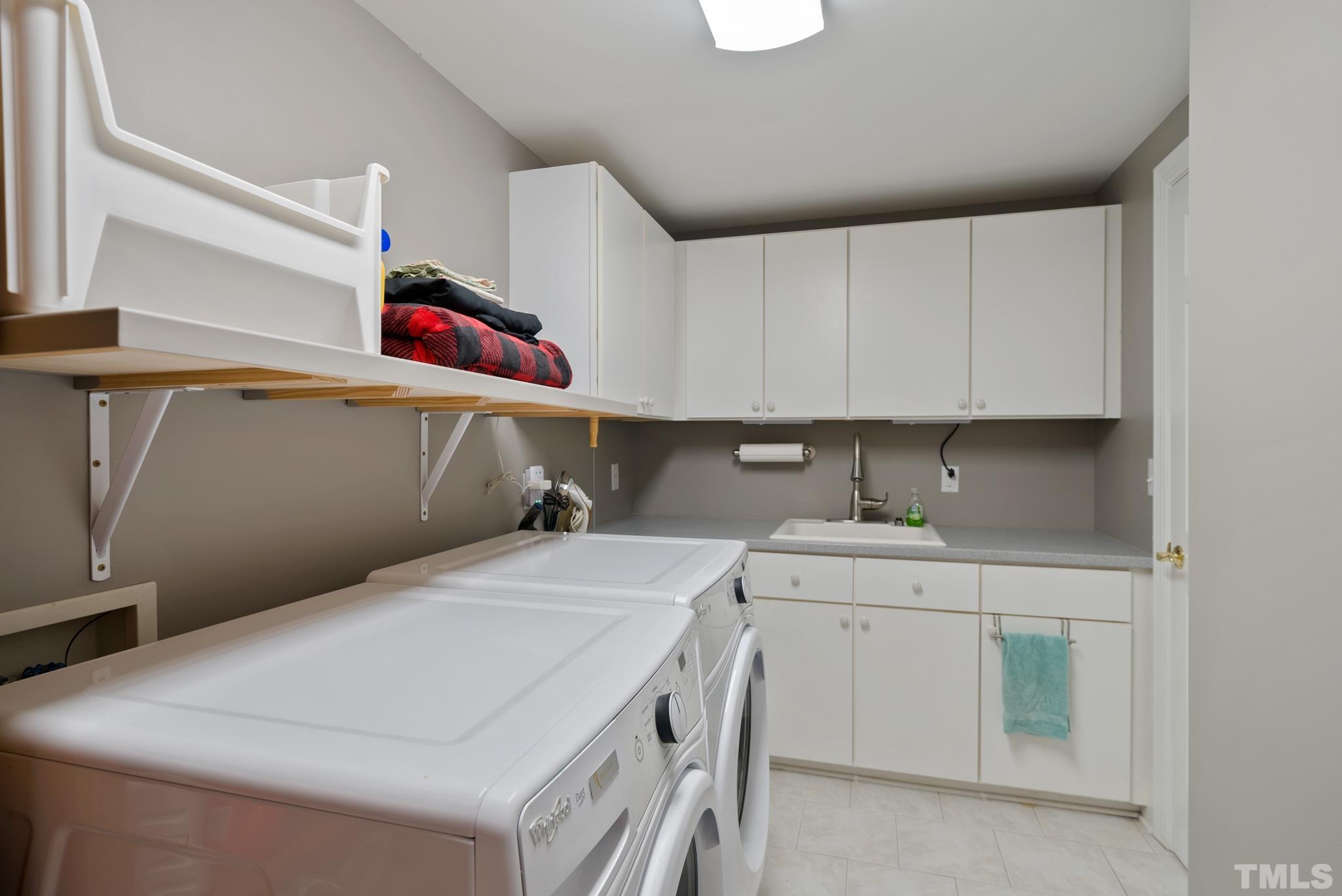 1616 Carl Durham Road Chapel Hill, NC 27516 - Photo 32 of 56 a utility room with dryer and washer
