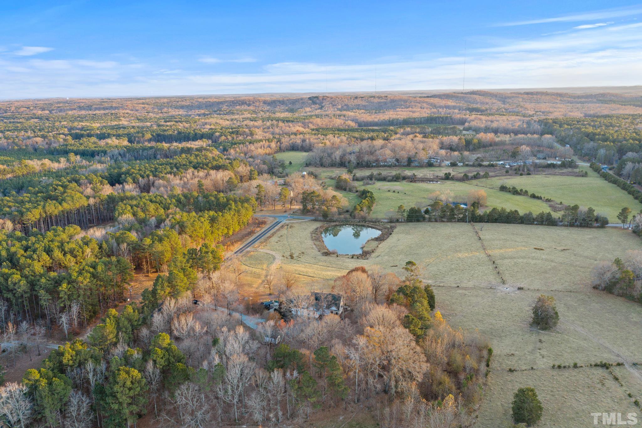 1616 Carl Durham Road Chapel Hill, NC 27516 - Photo 33 of 56 a view of a lake with a city