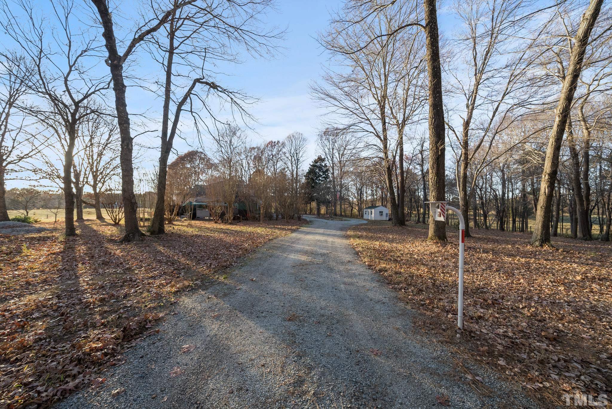 1616 Carl Durham Road Chapel Hill, NC 27516 - Photo 34 of 56 a view of outdoor space with lots of trees
