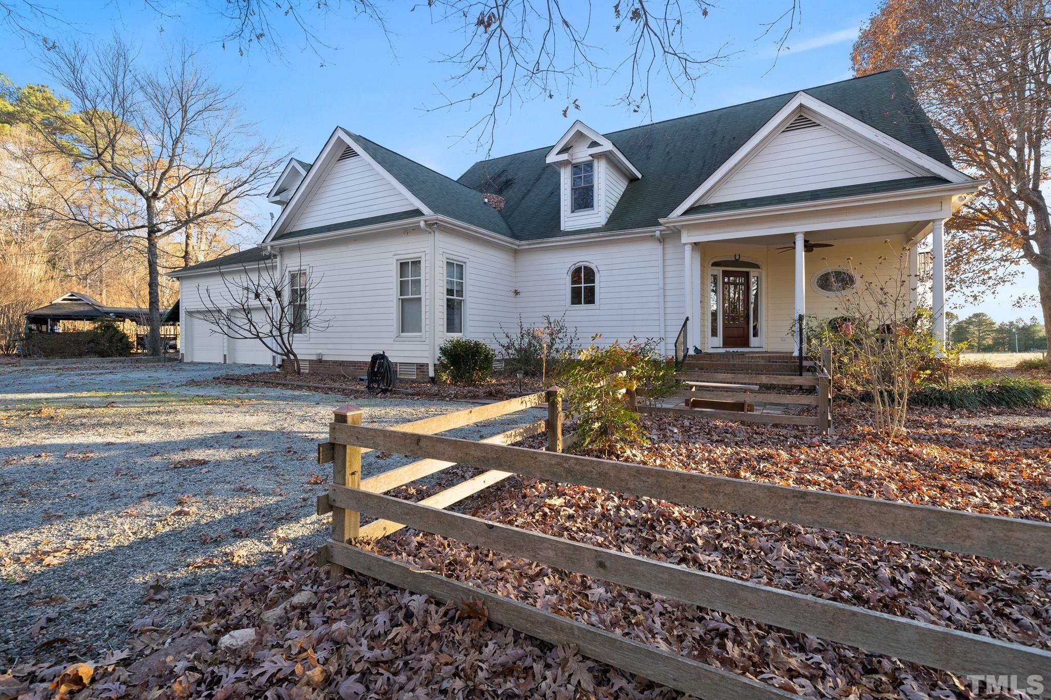 1616 Carl Durham Road Chapel Hill, NC 27516 - Photo 37 of 56 a front view of a house with garden