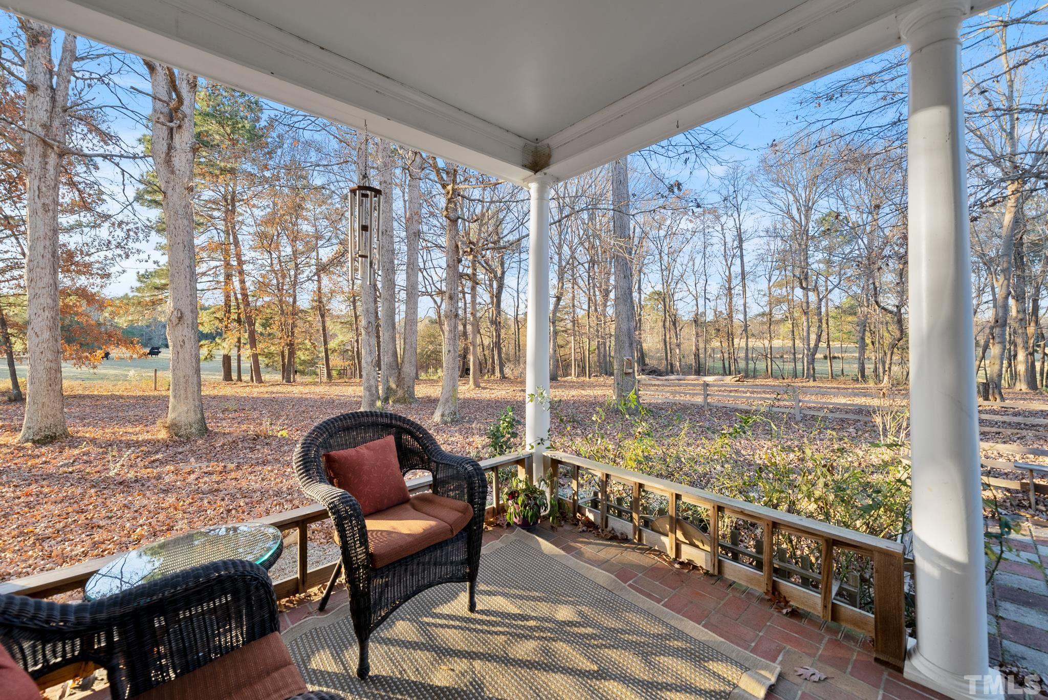 1616 Carl Durham Road Chapel Hill, NC 27516 - Photo 39 of 56 a living room with large windows