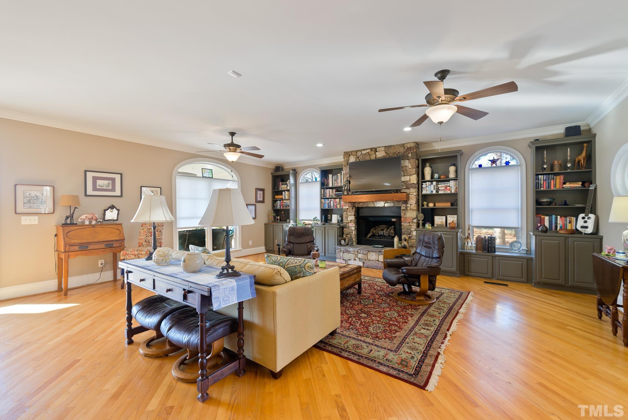 1616 Carl Durham Road Chapel Hill, NC 27516 - Photo 4 of 56 a living room with furniture and wooden floor