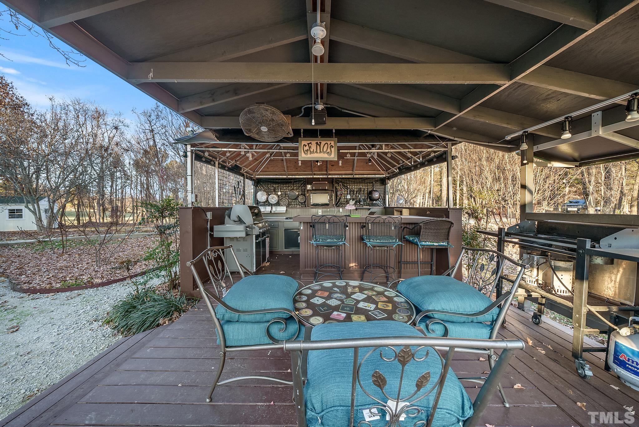 1616 Carl Durham Road Chapel Hill, NC 27516 - Photo 51 of 56 a view of a chairs and table in patio
