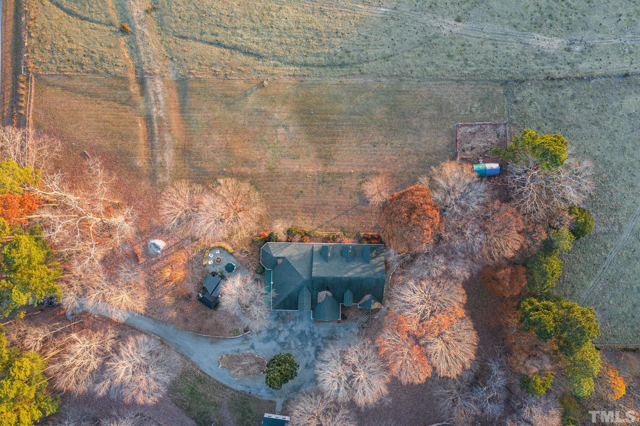 1616 Carl Durham Road Chapel Hill, NC 27516 - Photo 55 of 56 a bathroom with a sink and a mirror