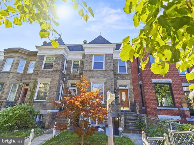 a front view of a multi story residential apartment building
